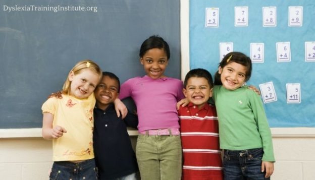 Dyslexia and Diversity: Where is the Diversity? (Image features a Group of children standing in front of a blackboard.)